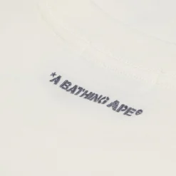 A Bathing Ape Garment Dye Spray Print College Relaxed Fit Tee